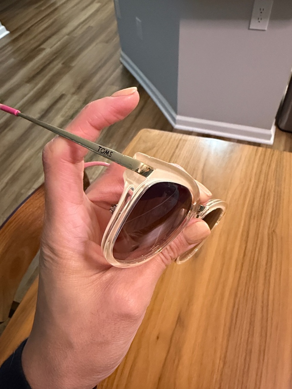 TOMS Clear Frame Sunglasses with Pink Temple Tips and Brown Lenses